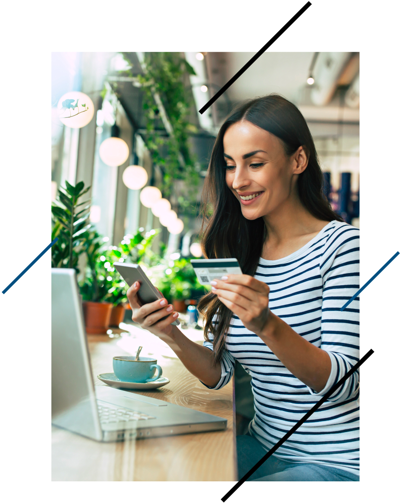 CWA Hero Image - woman looking at credit card and phone in a coffee shop.